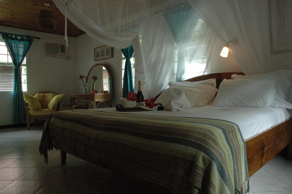 Kokogrove Chalets Villa Anse Royale Room photo